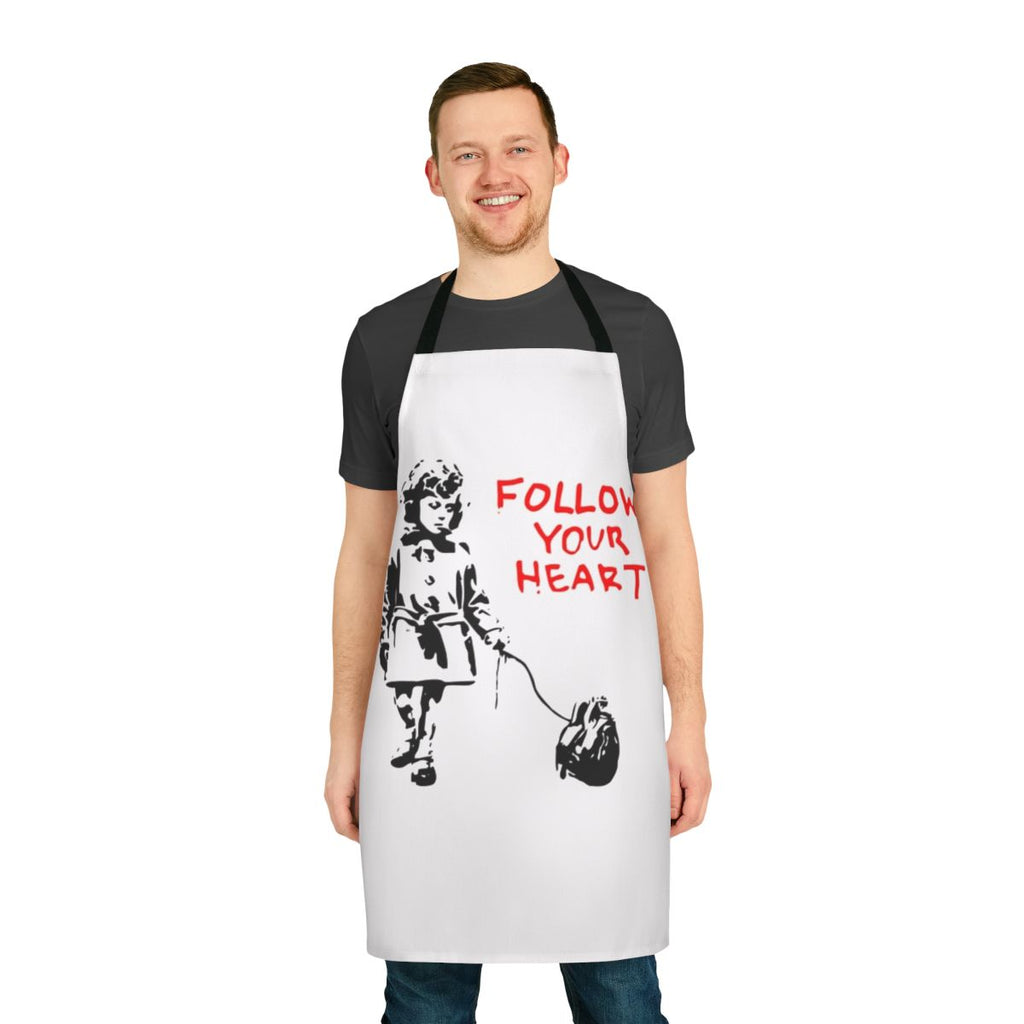 Banksy-inspired apron featuring the iconic 'Follow Your Heart' design