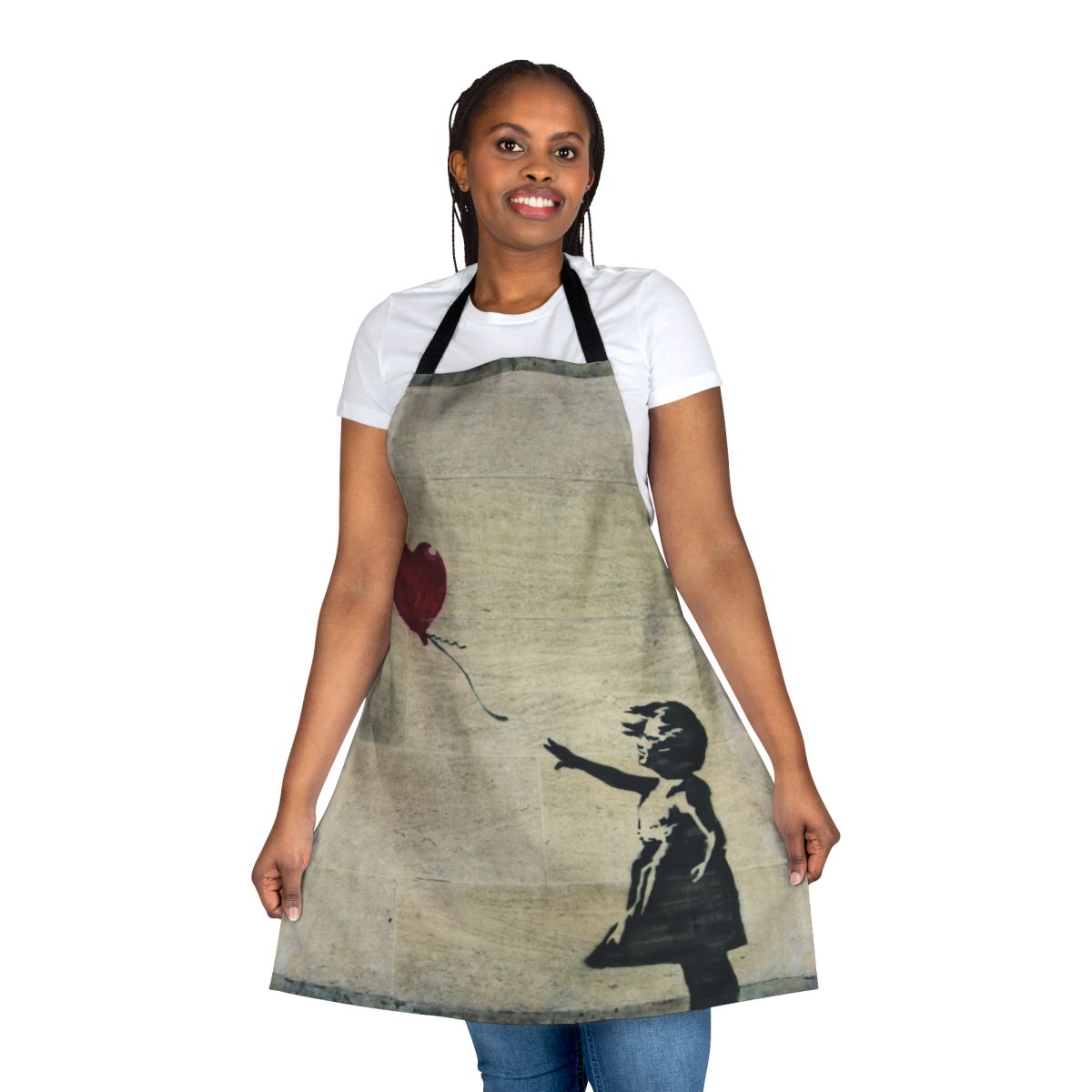 Apron featuring a stencil-style design inspired by Banksy's iconic "Girl with a Red Balloon" artwork