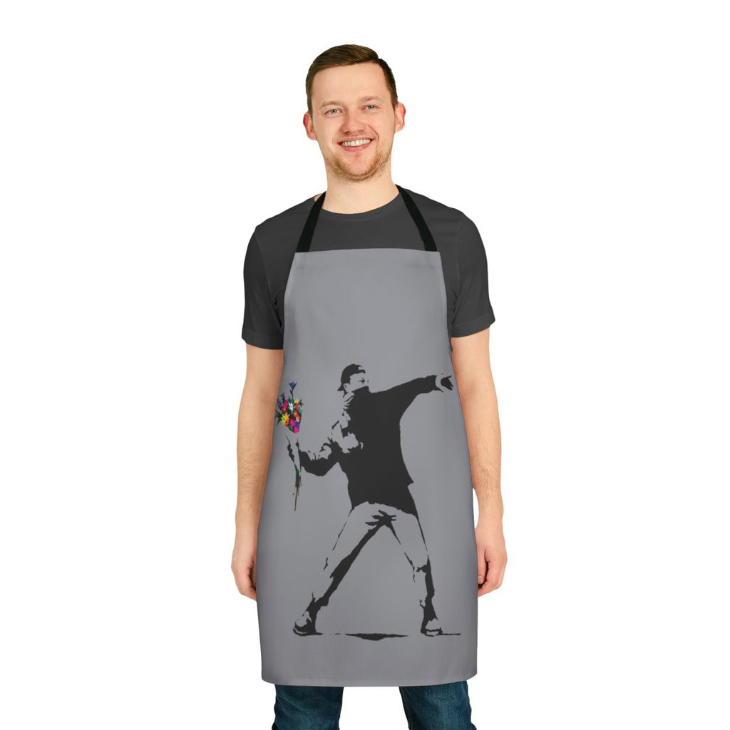 "A stylish and durable apron featuring the iconic Banksy-inspired graffiti 'Rage Flower Thrower' design"