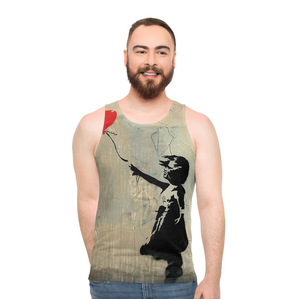 Banksy-inspired red tank top with heart balloon graphic