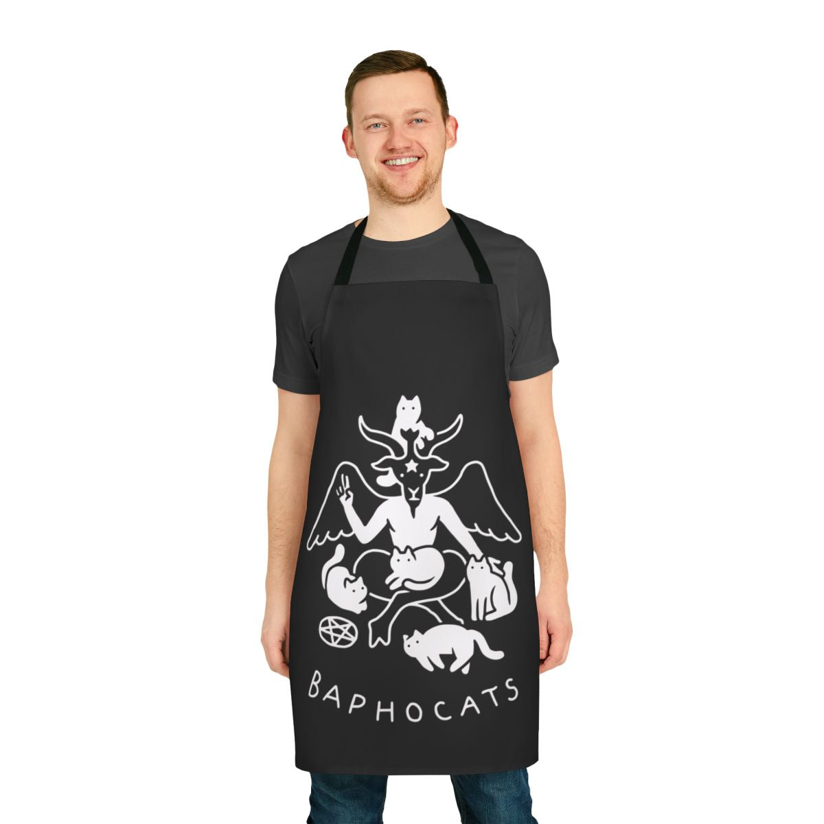 Model wearing a black apron with a Baphomet cat design, perfect for fans of dark fashion and metal music.