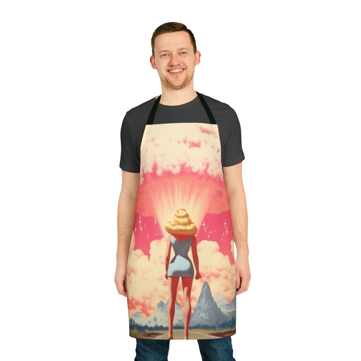 A white apron with a playful "Barbenheimer" design, referencing the 2023 Barbie and Oppenheimer films.