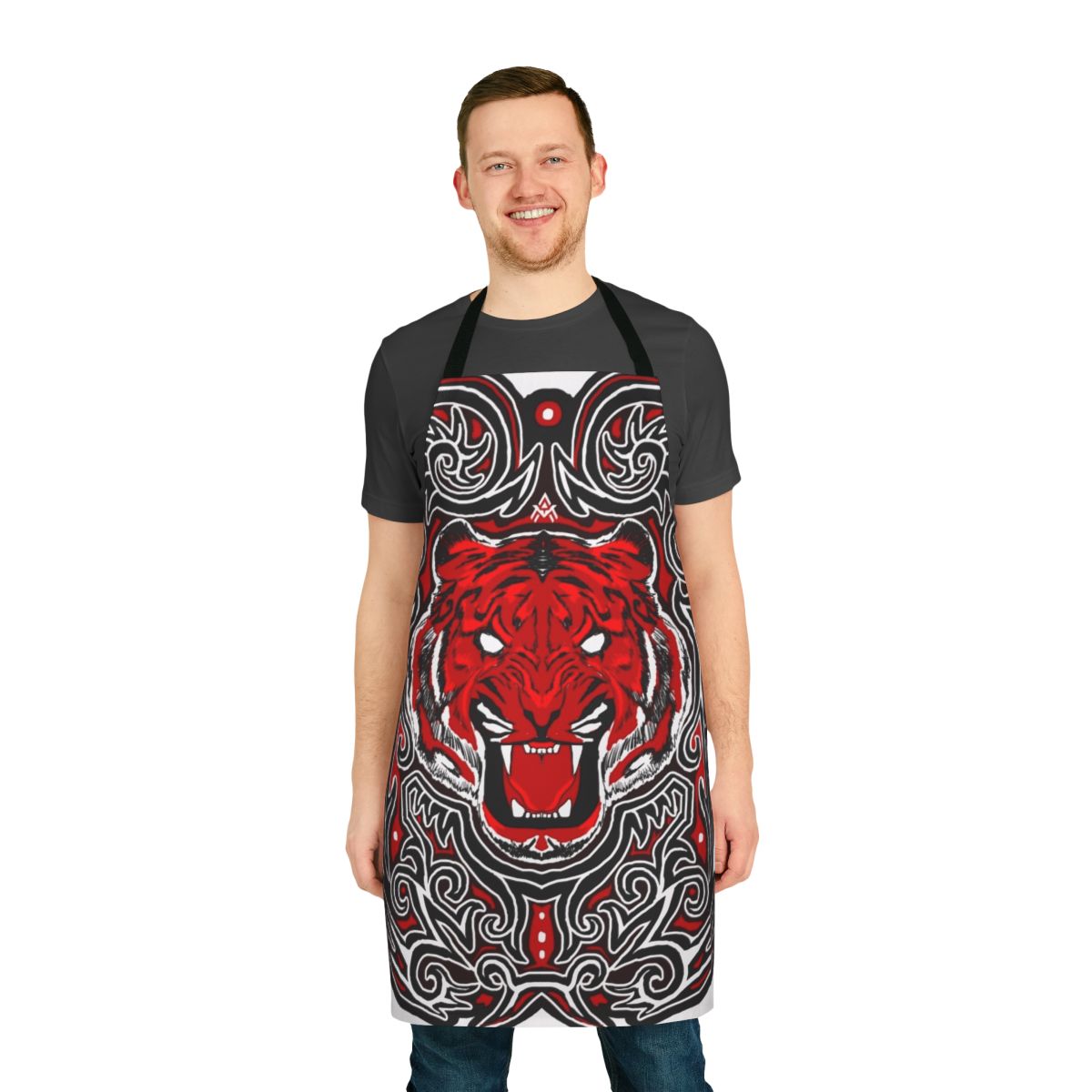 Red and black apron with a fierce tiger design, inspired by traditional Batak patterns from Indonesia.