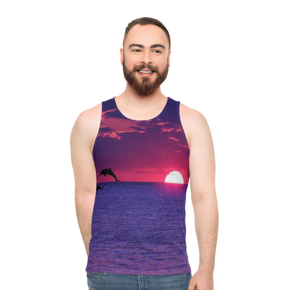 Unisex tank top featuring a breathtaking beach sunset in pink and purple sky