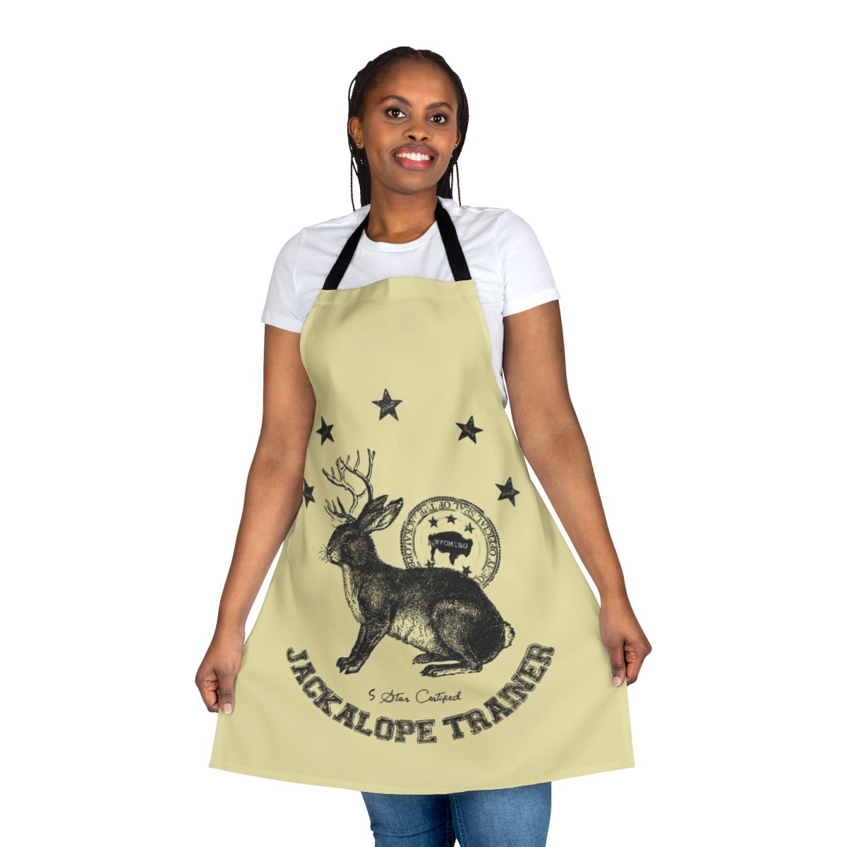 Beige apron with a whimsical jackalope illustration, perfect for animal trainers and veterinary staff.