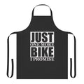 A durable, high-quality apron with the humorous phrase "Just One More Bike I Promise" printed on it, perfect for bike enthusiasts.