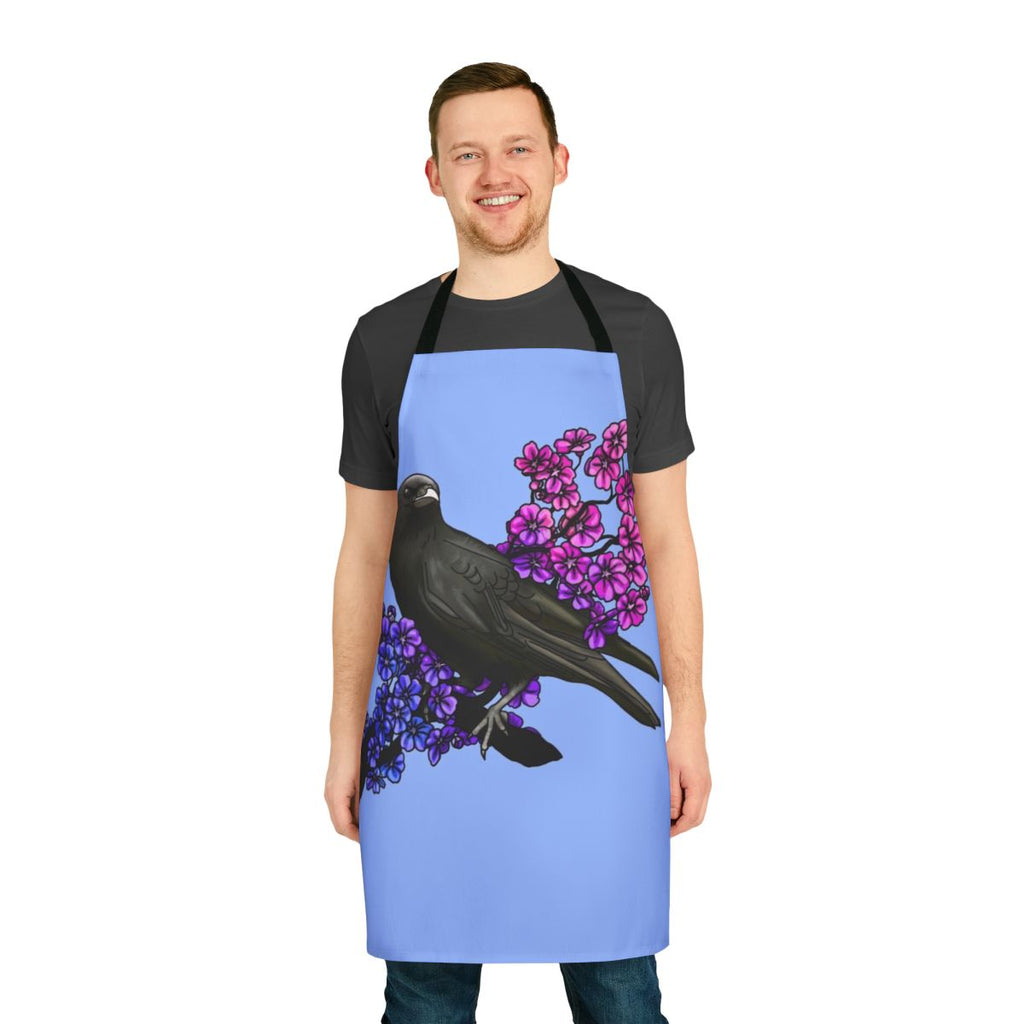 Bisexual crow and floral design apron featuring a black bird perched on a cherry blossom branch against a pastel background.