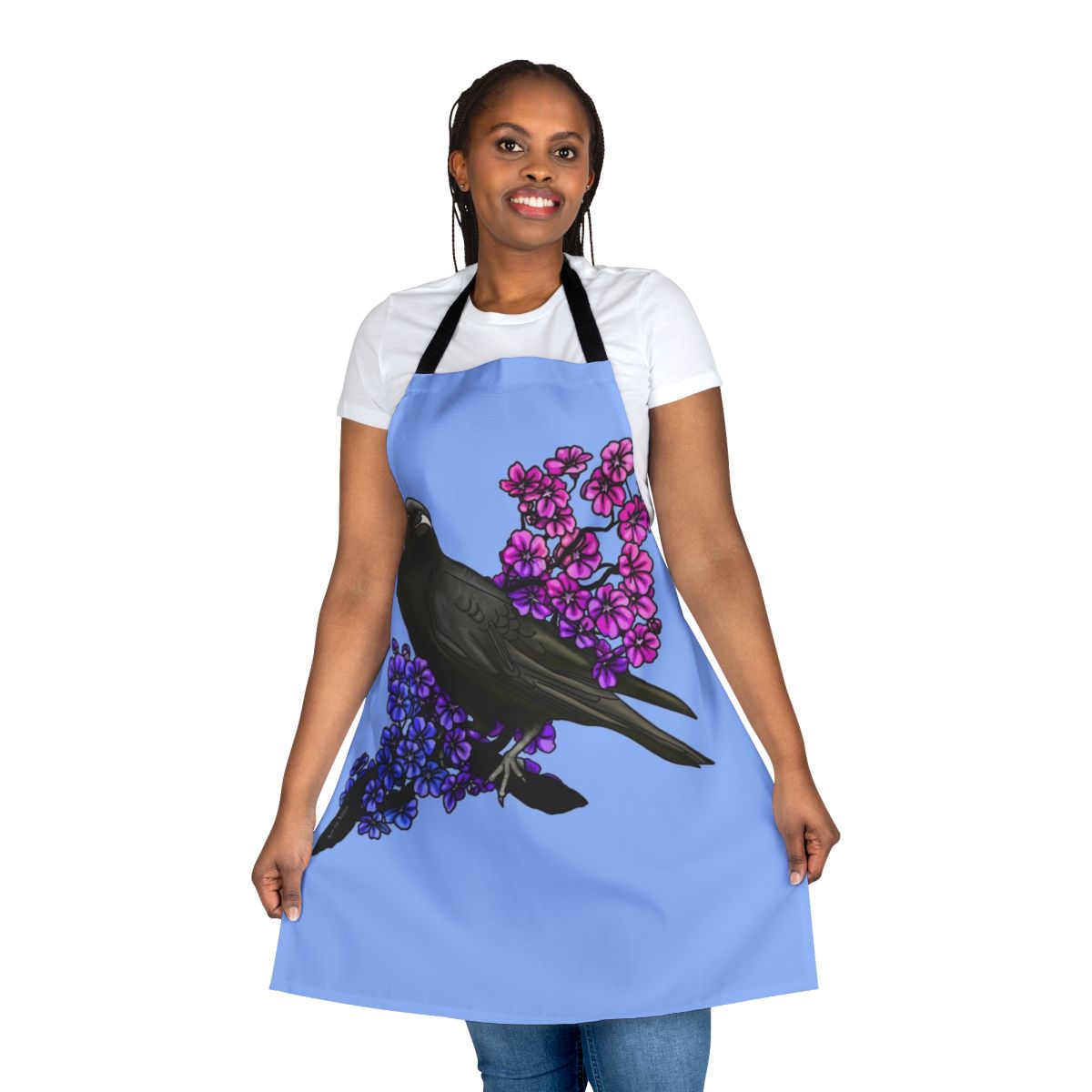 Bisexual crow and floral design apron featuring a black bird perched on a cherry blossom branch against a pastel background.