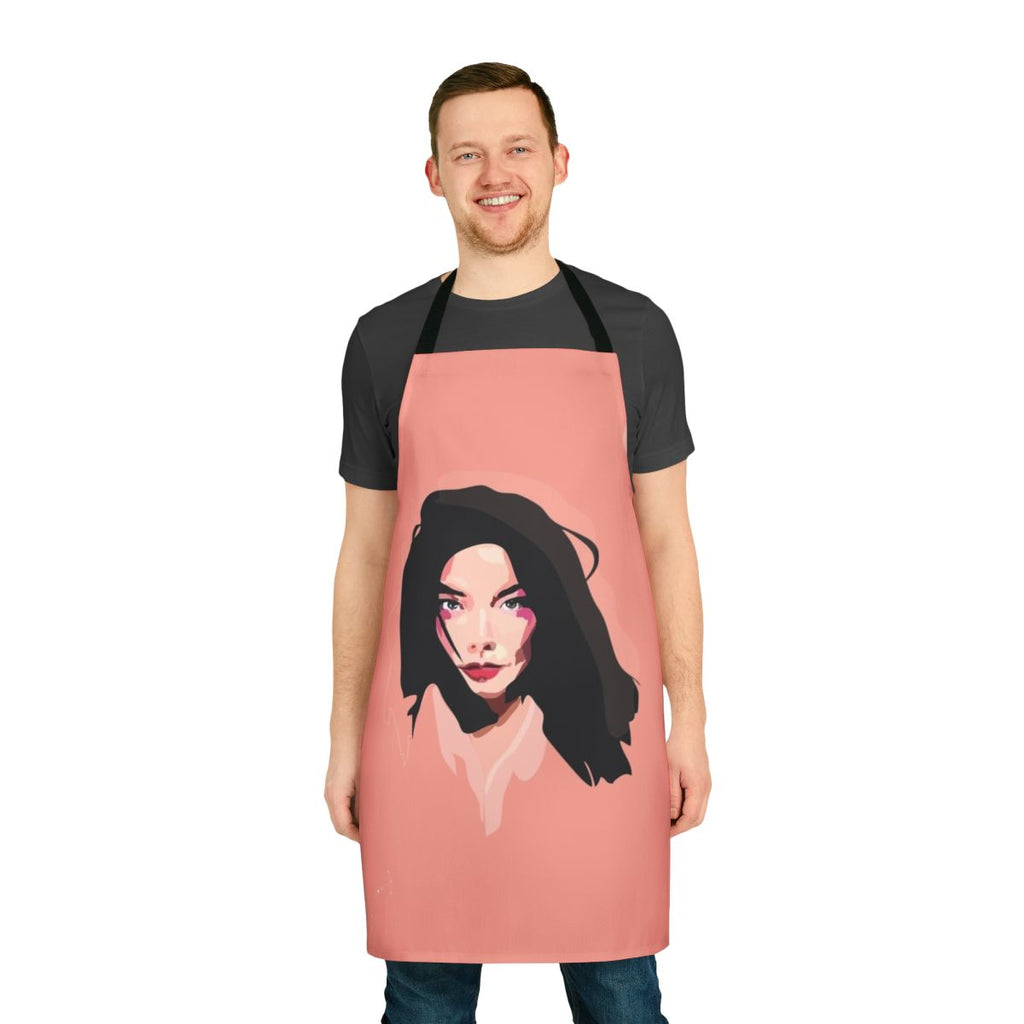 Bjork inspired pink apron with scorpio moon and cute cheeks design, ideal for alternative music fans and creative cooks.