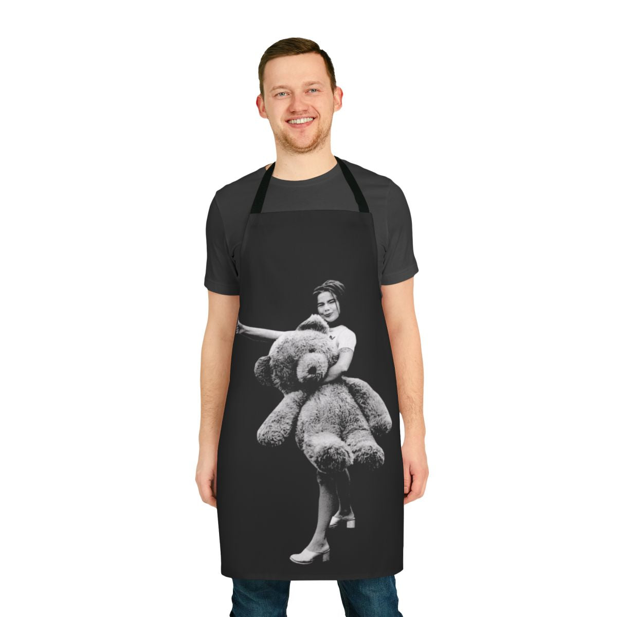 A whimsical apron featuring a teddy bear design, inspired by the iconic Icelandic artist Bjork.