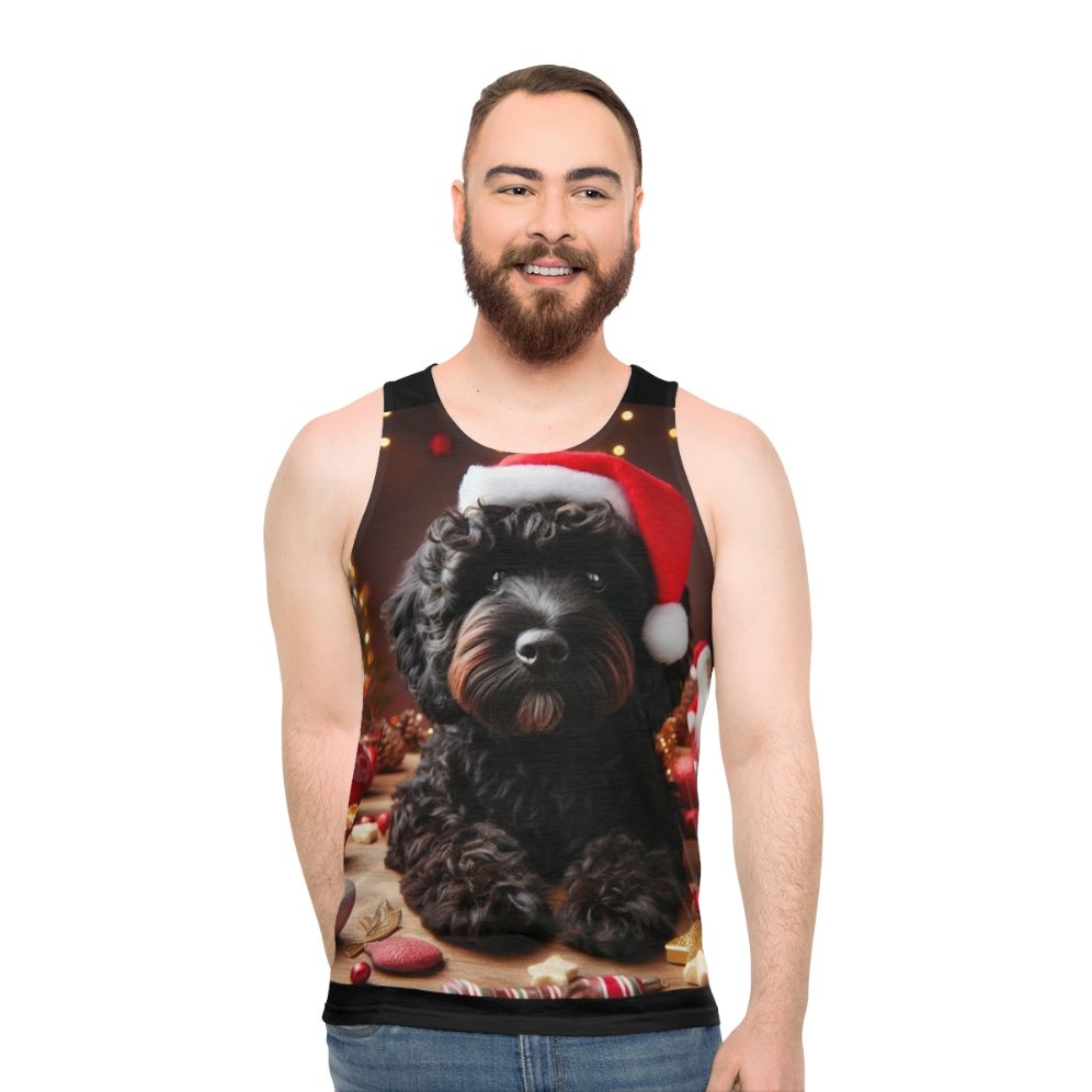 Black cockapoo wearing a santa hat design on a unisex tank top