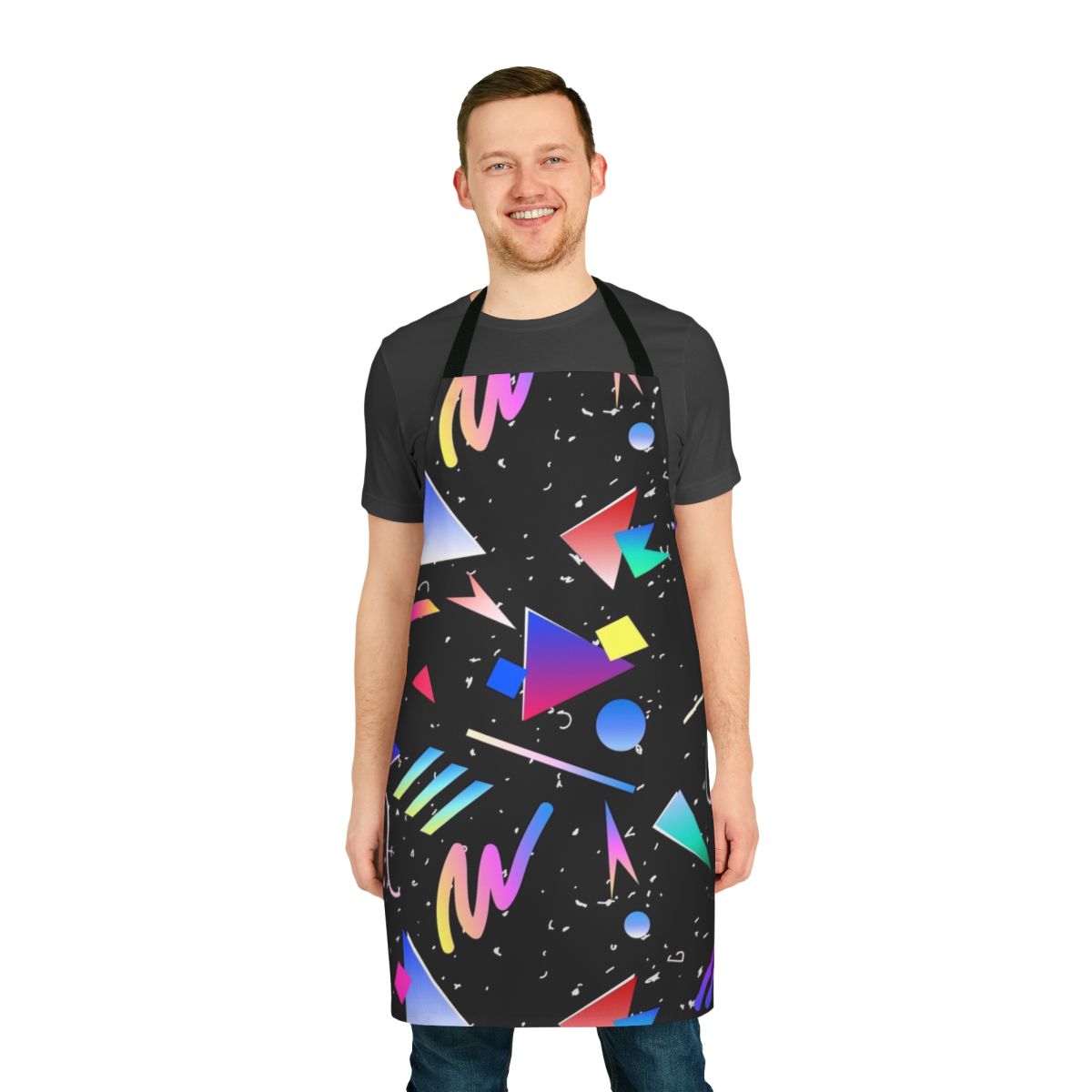 A bold black and white geometric apron with a retro 80s 90s inspired design
