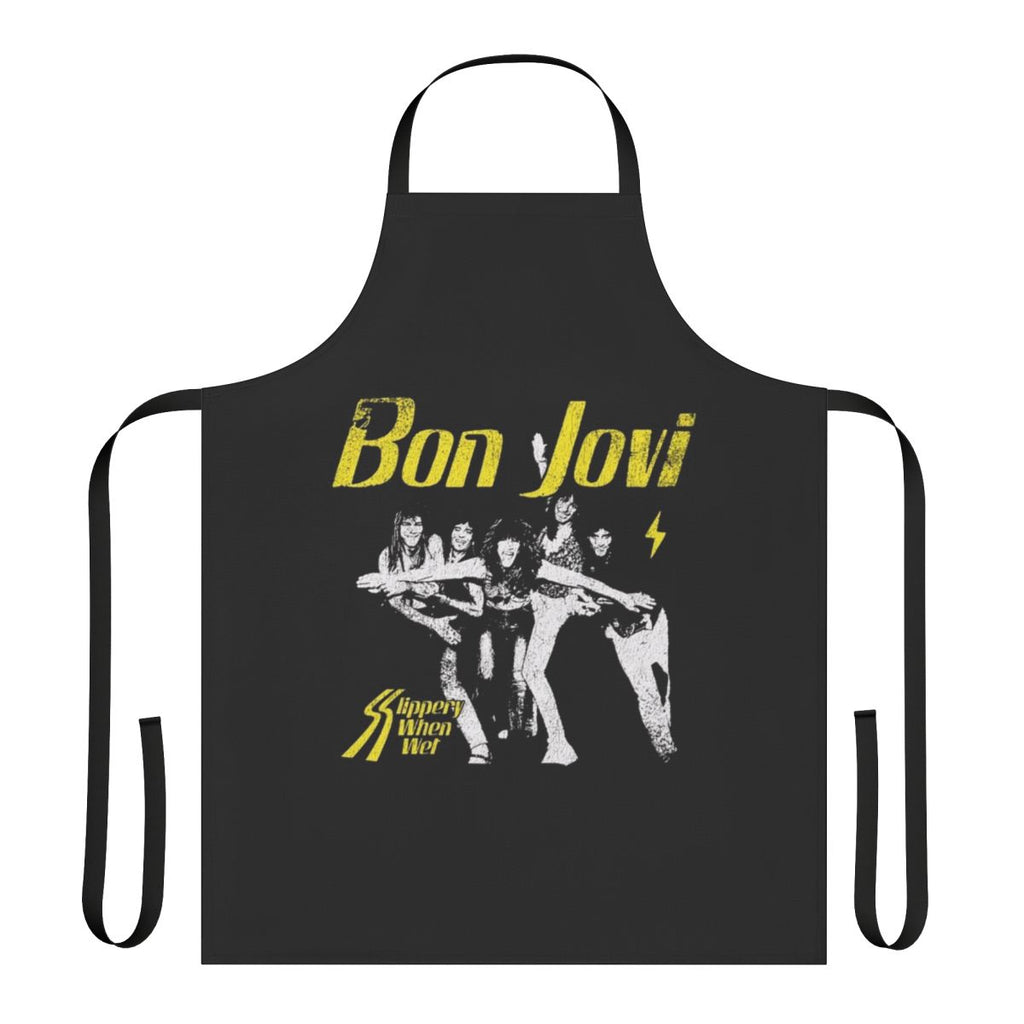 A black cooking apron featuring a heart dagger design, inspired by the Bon Jovi album "Slippery When Wet"