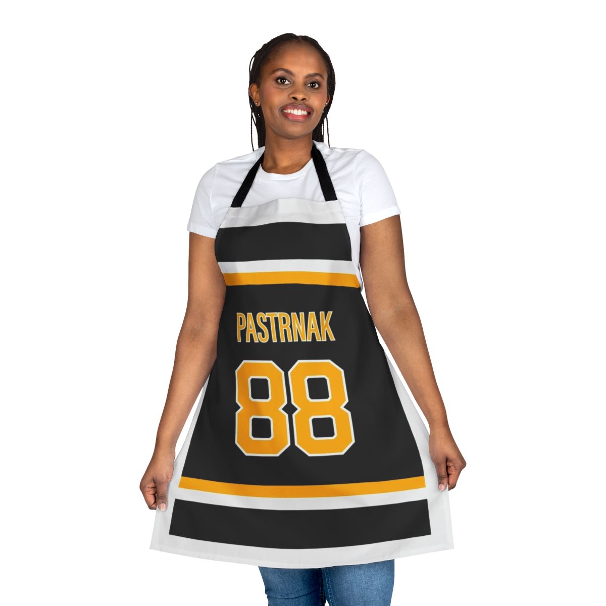 Cooking apron featuring the jersey design of Boston Bruins hockey player David Pastrnak