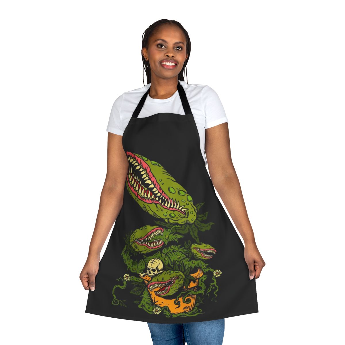 Apron featuring a detailed illustration of a venus fly trap plant in a cartoonish horror style, designed by artist Mike Zug.