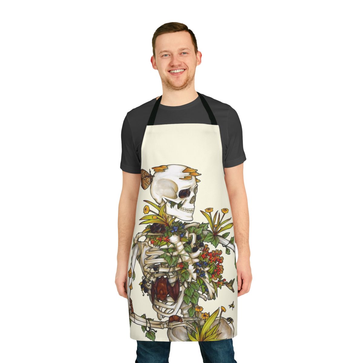 Apron featuring a botanical skeleton art design with bones, plants, and flowers