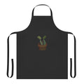 A unique apron featuring a playful design of two venus flytraps in love, perfect for plant enthusiasts.