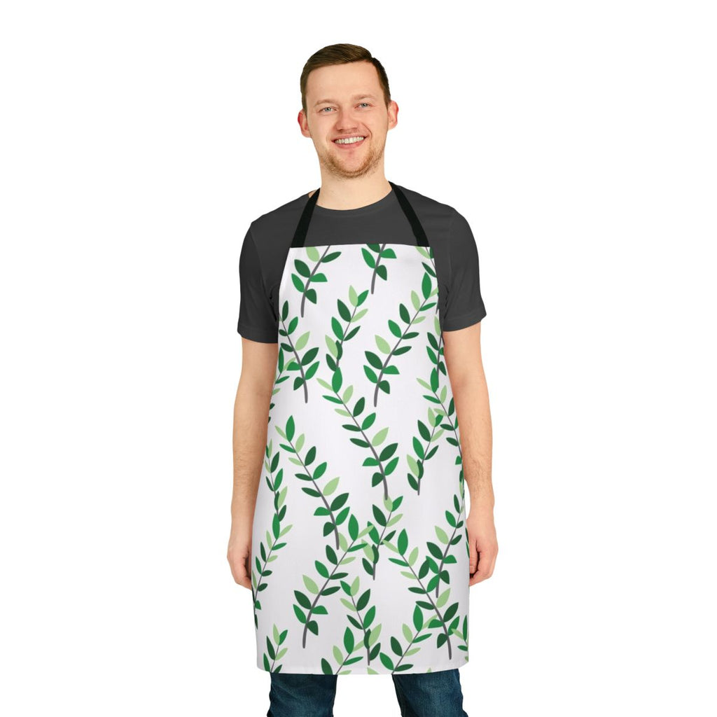 Apron featuring a botanical pattern of green and white ZZ plant leaves