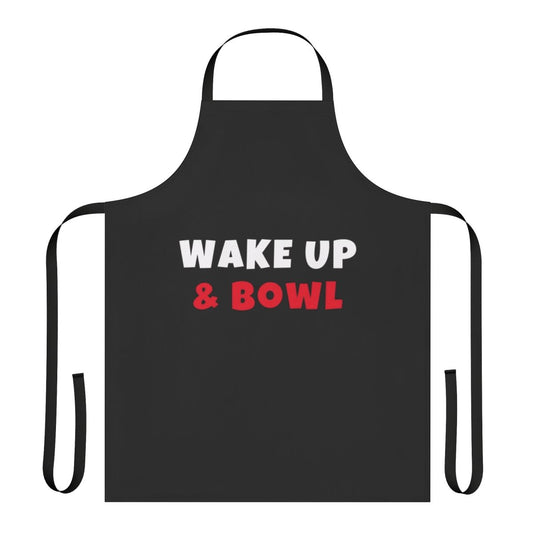 Person wearing a t-shirt apron with "Wake Up and Bowl" design