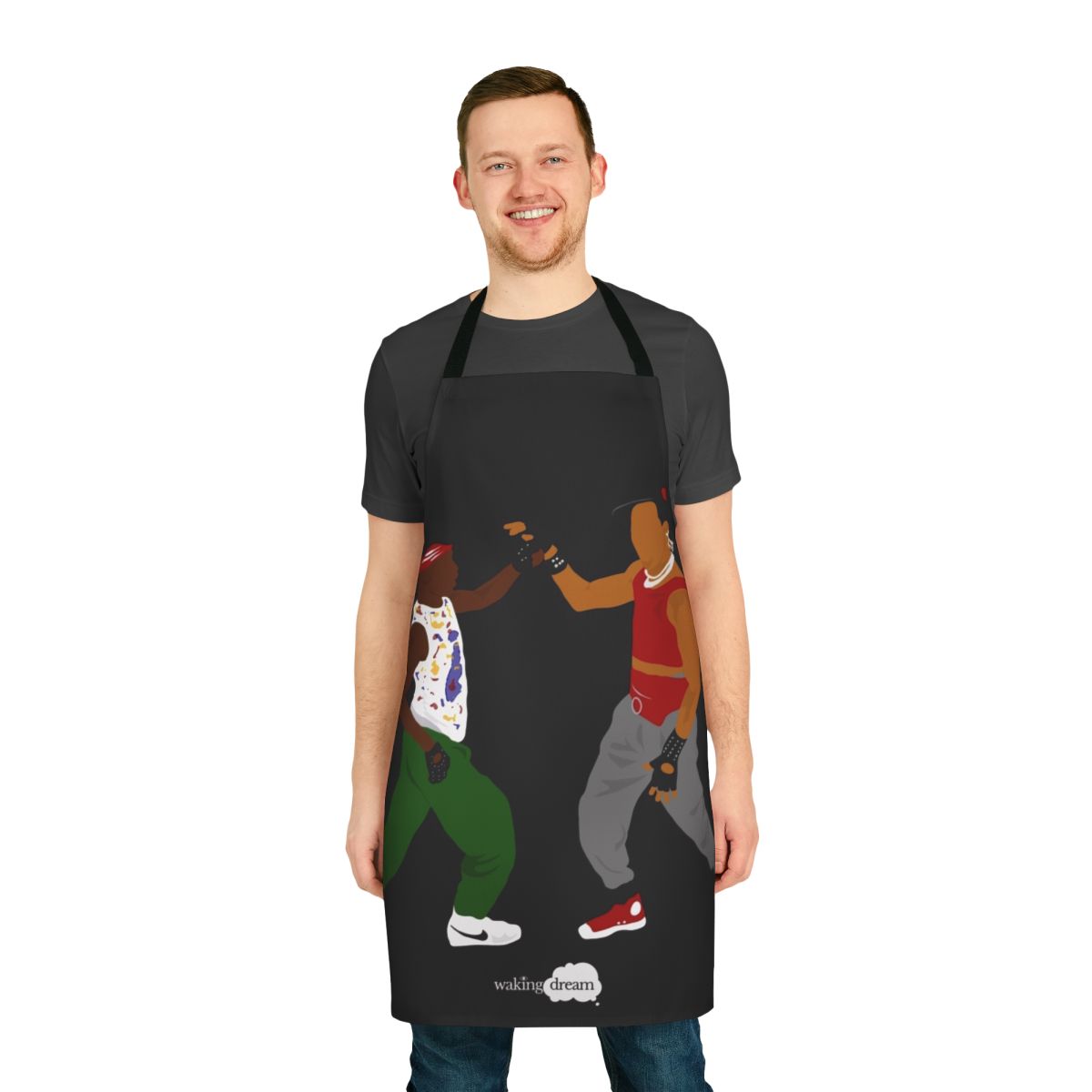 A colorful apron featuring breakdance, hip hop, and shrimp dancing motifs.