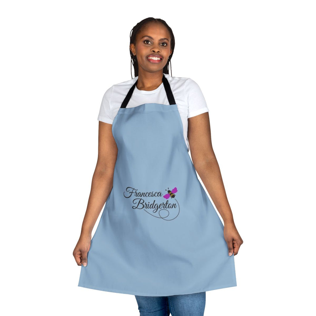 A white apron with a bee design, inspired by the character Francesca Bridgerton from the Netflix series Bridgerton.