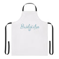 Blue apron with Bridgerton-inspired design, featuring floral patterns and lace details