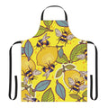A vibrant yellow apron featuring a lemon and bee garden design
