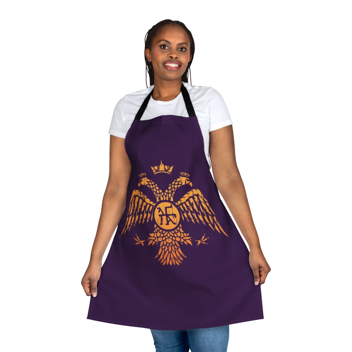 A purple apron featuring a bold, Byzantine-inspired 2-headed eagle symbol design.