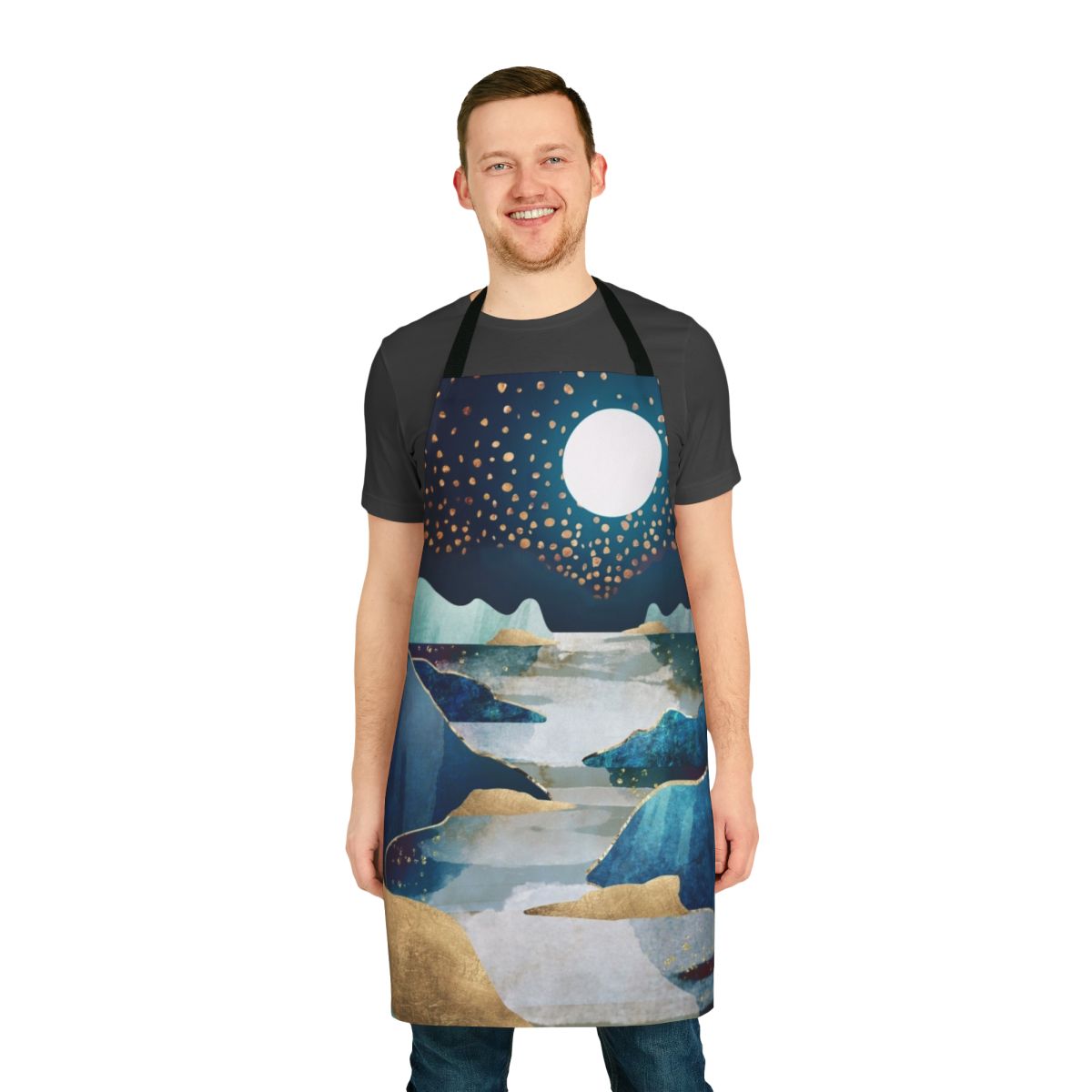 A beautifully designed apron featuring a captivating celestial landscape with a glowing moon, stars, and a serene waterscape.