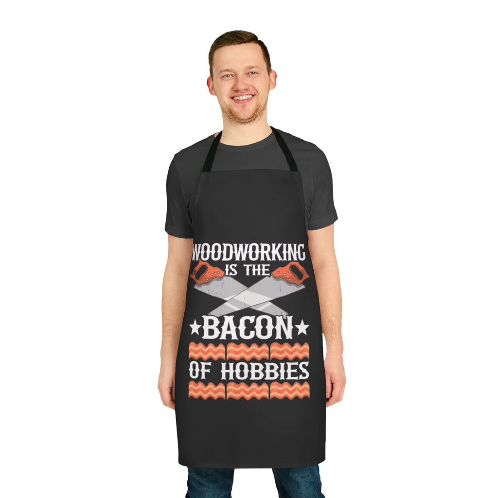 Carpenter wearing a bacon-themed apron with pockets for tools