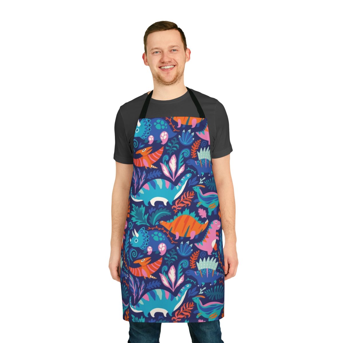 A colorful cartoon dinosaur themed apron for children