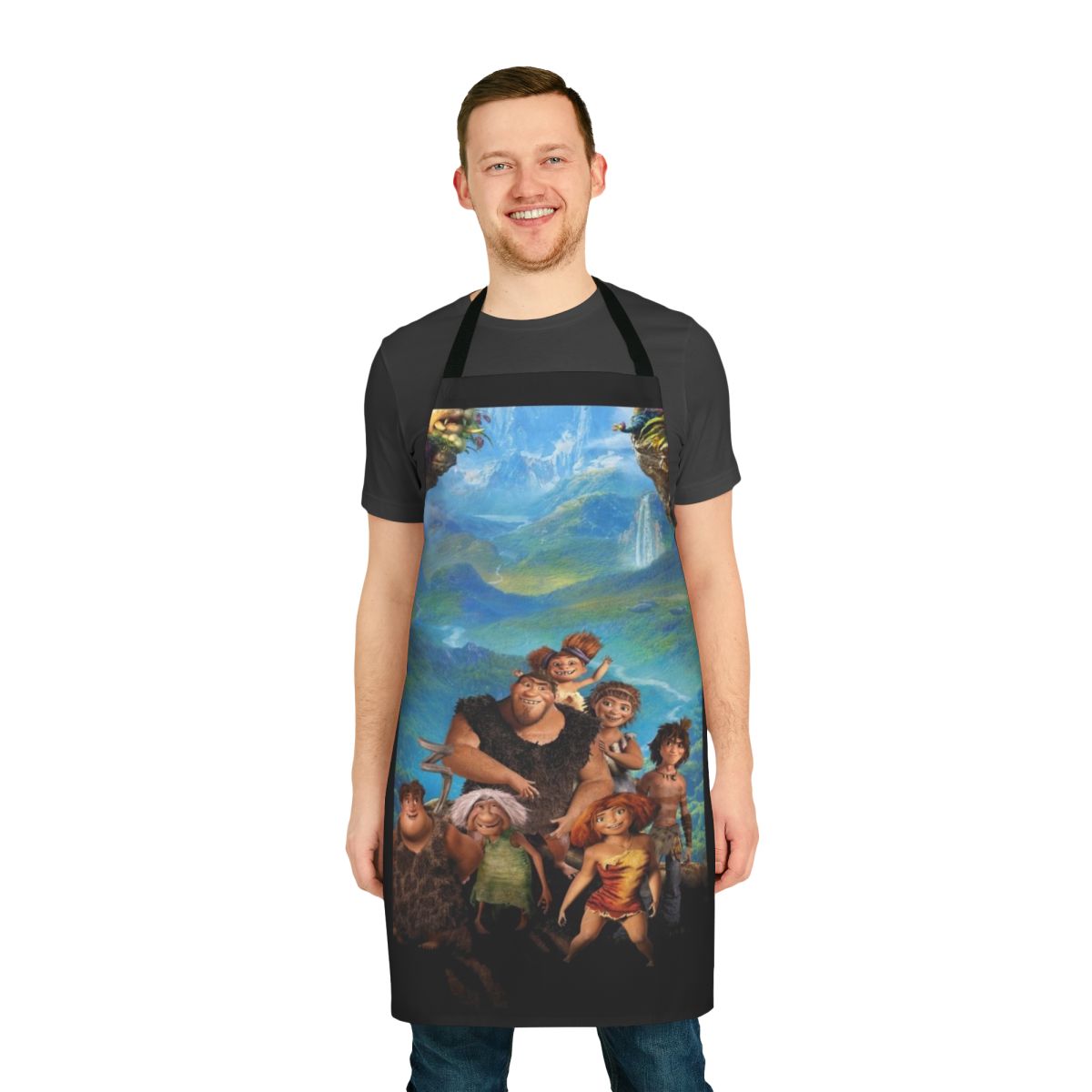 The Croods A New Age themed apron with cartoon characters Grug, Eep, Guy, Ugga, Thunk, Sandy, and Gran