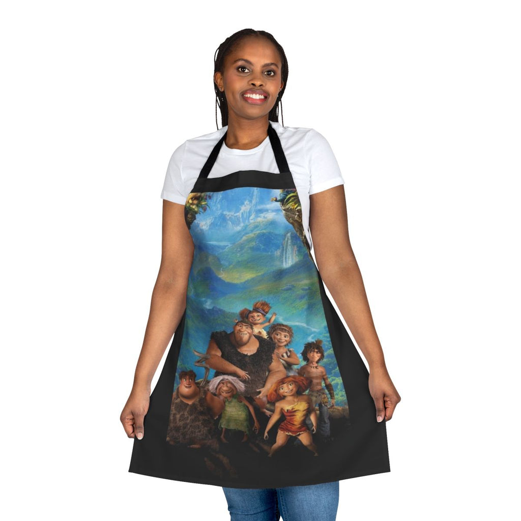 The Croods A New Age themed apron with cartoon characters Grug, Eep, Guy, Ugga, Thunk, Sandy, and Gran