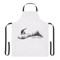 Snowboard enthusiast wearing a stylish apron featuring a snowboarding design in a winter forest setting