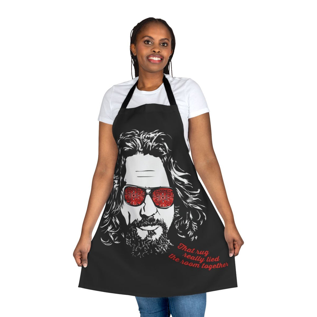A white apron featuring the iconic image of The Dude from the movie The Big Lebowski
