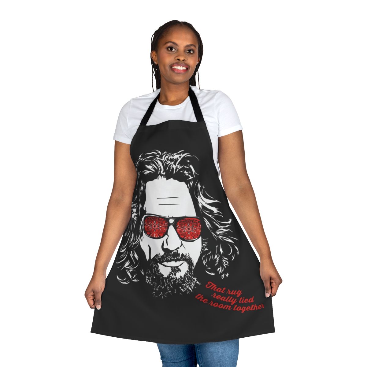 A white apron featuring the iconic image of The Dude from the movie The Big Lebowski