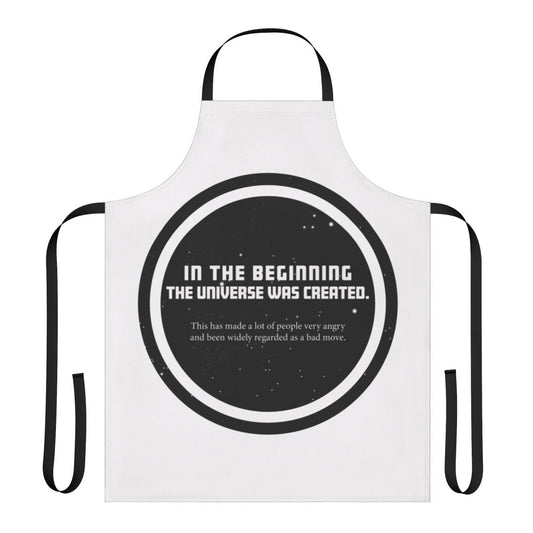 A black apron featuring a quote from the Hitchhiker's Guide to the Galaxy series by Douglas Adams
