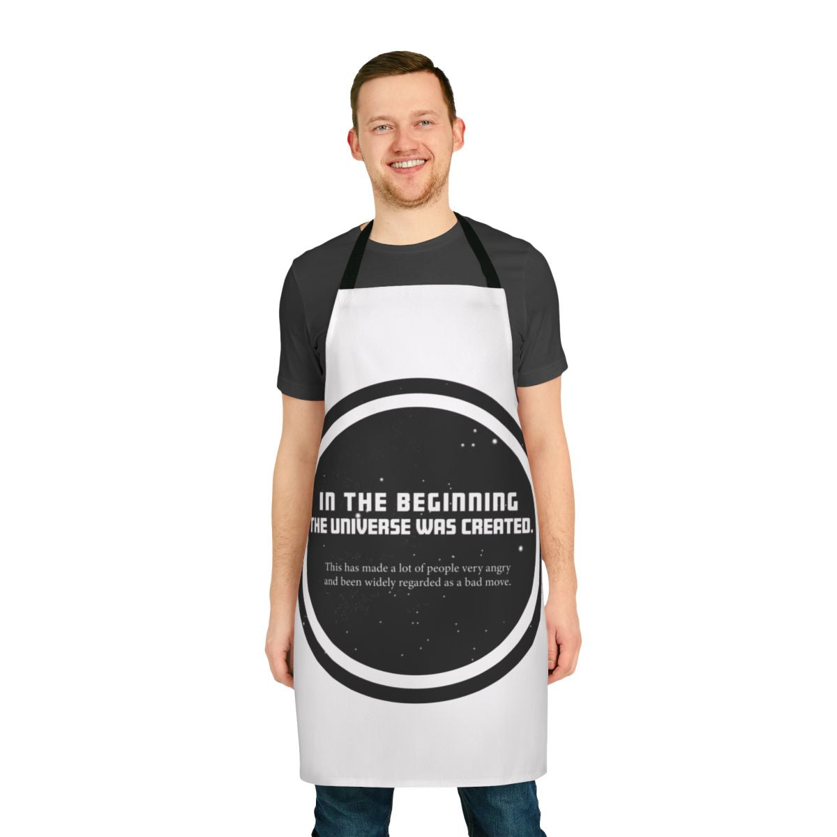 A black apron featuring a quote from the Hitchhiker's Guide to the Galaxy series by Douglas Adams