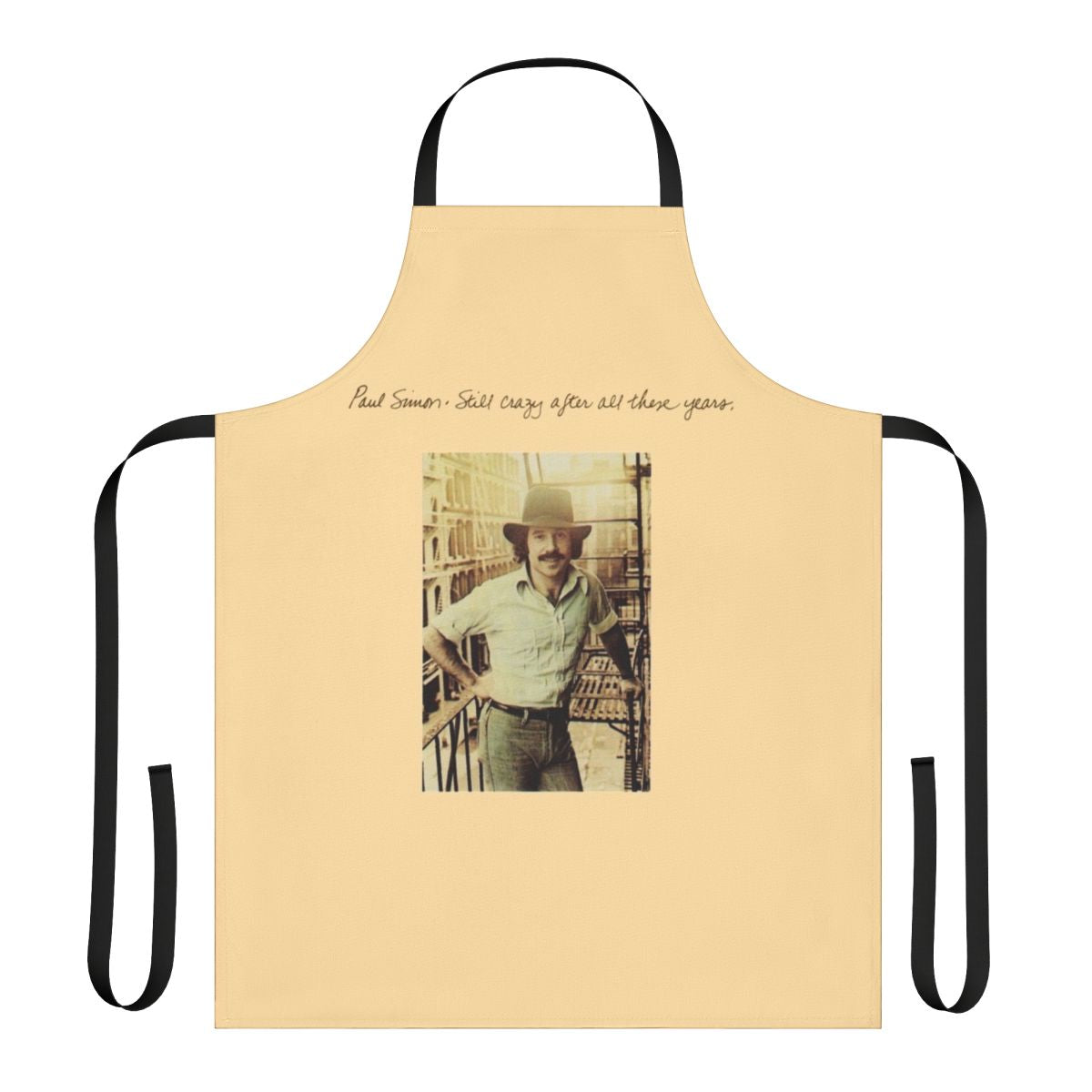 Vintage-inspired apron featuring the iconic album cover art of Paul Simon's "Still Crazy After All These Years"