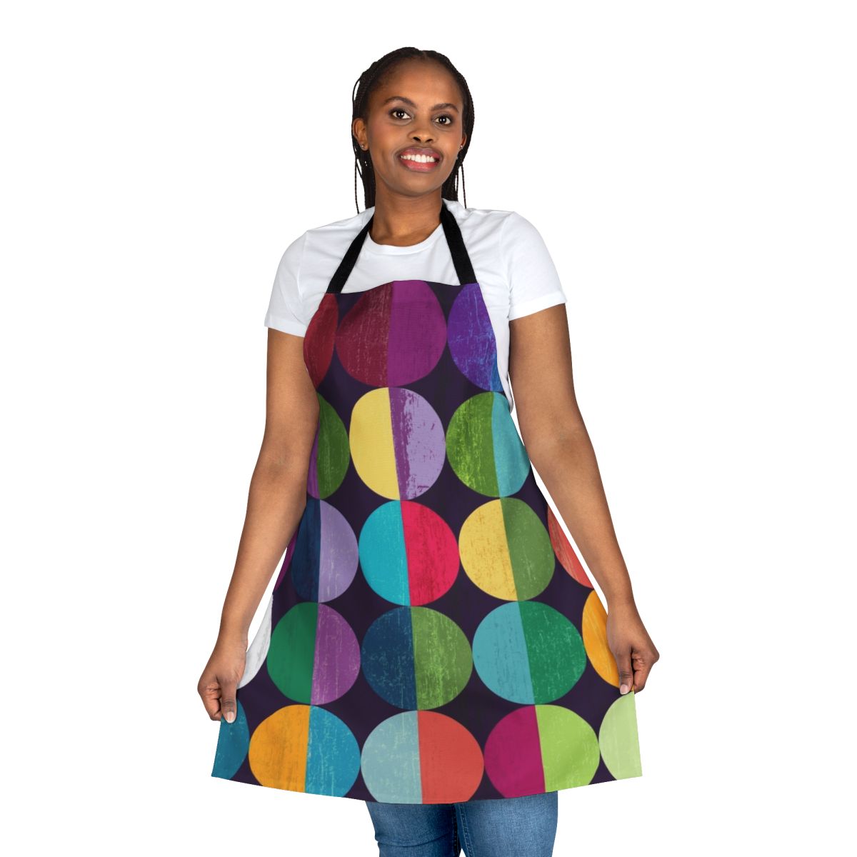 Geometric patterned apron featuring a moon design in shades of yellow, orange, blue, green, and pink.