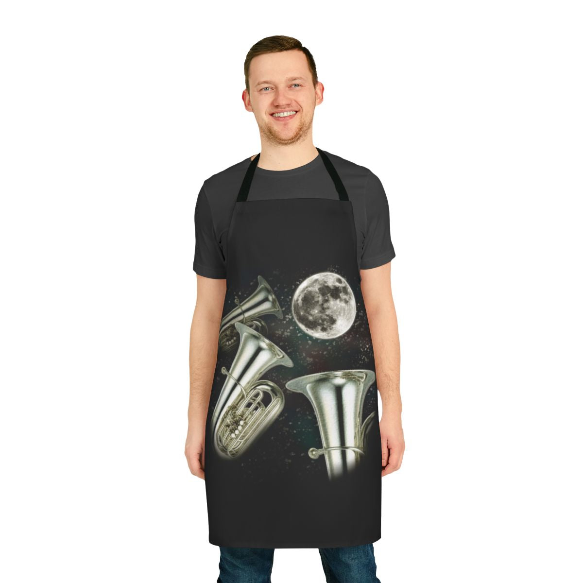 Apron featuring a design with three tubas against a night sky with a moon