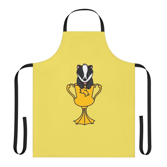 A whimsical apron featuring a cute, chibi-style baby badger design, perfect for Harry Potter fans and fantasy lovers.