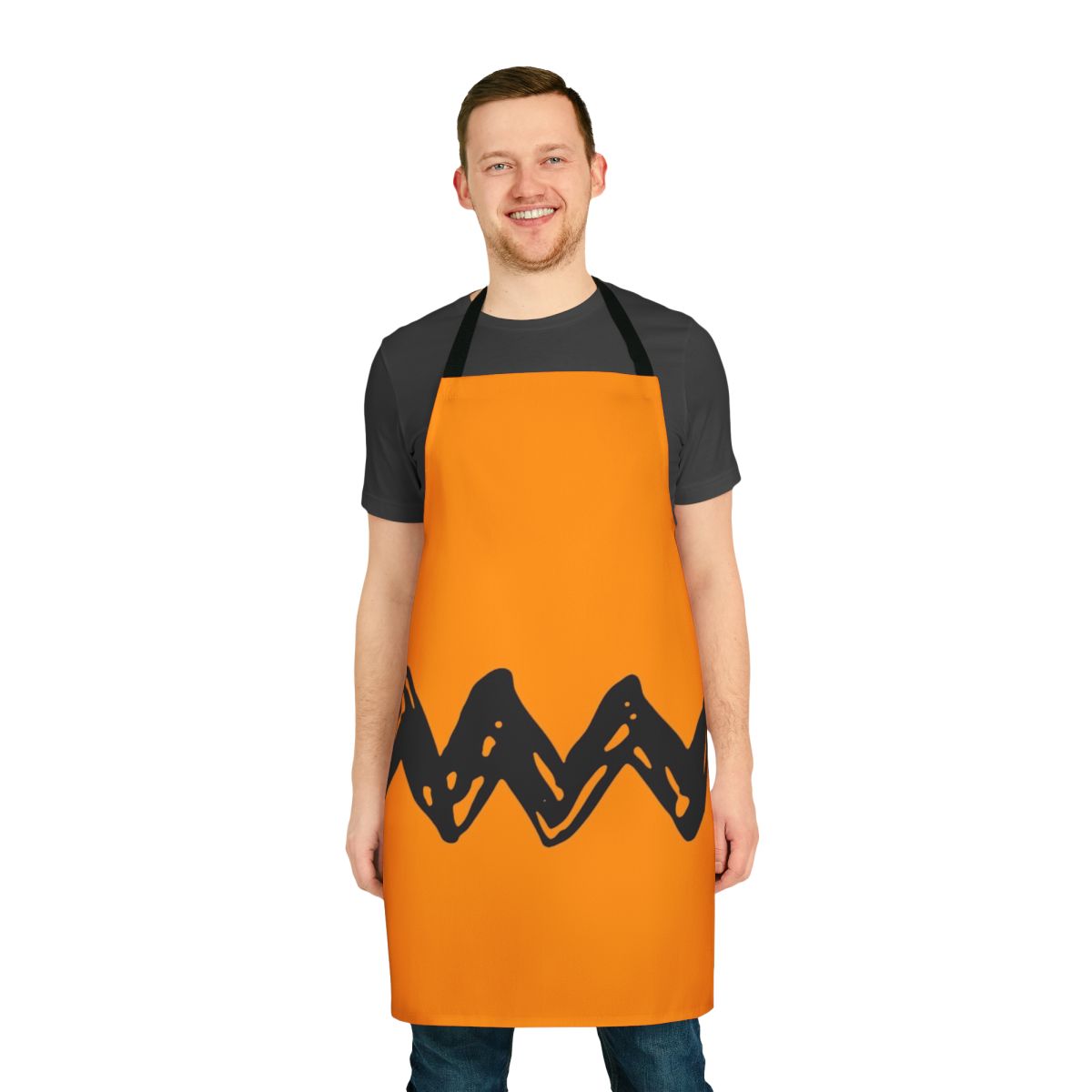 Black apron with ornament design, featuring Snoopy and Charlie Brown from the classic Peanuts cartoon.