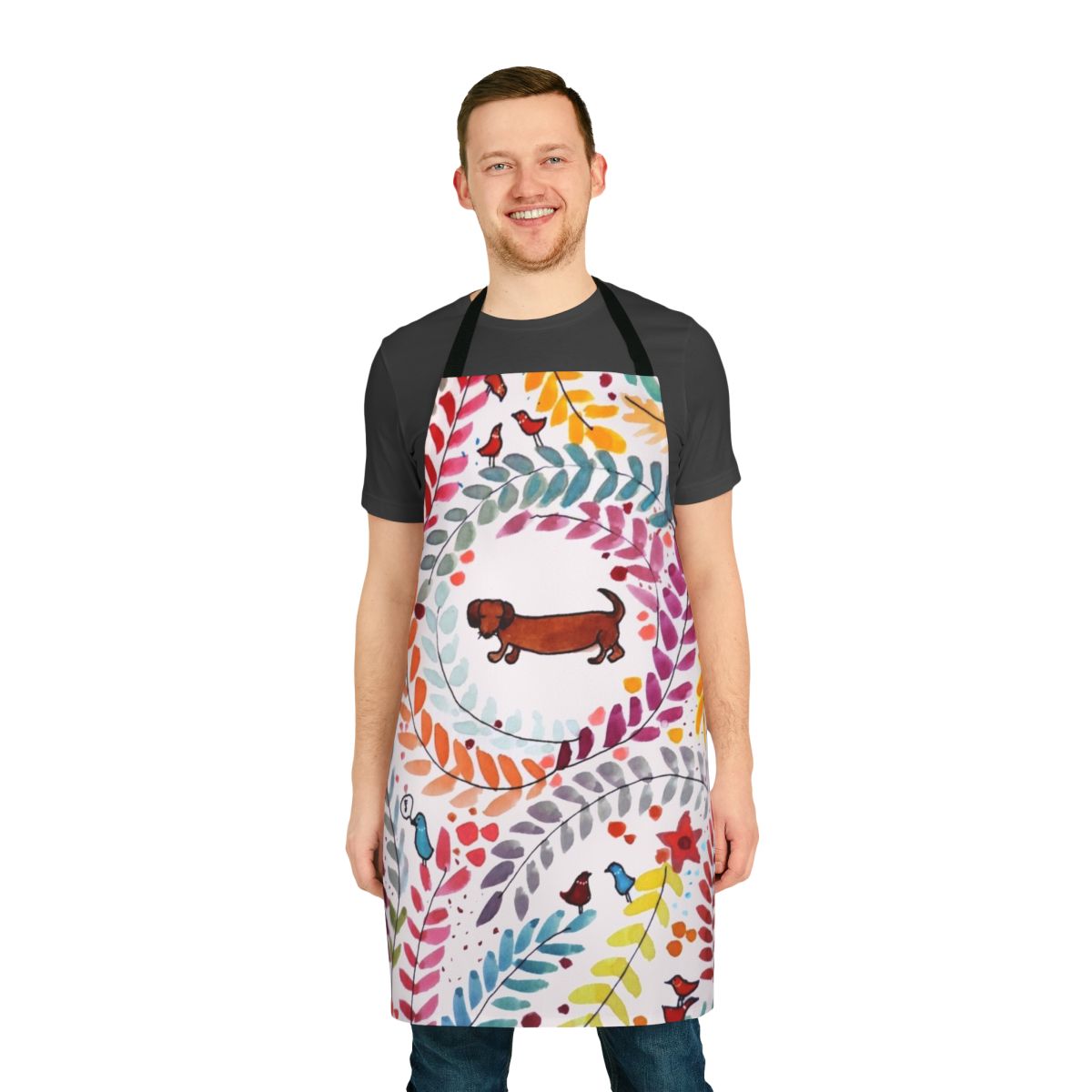 Colorful apron featuring a cute dachshund (teckel) design with floral and bird motifs
