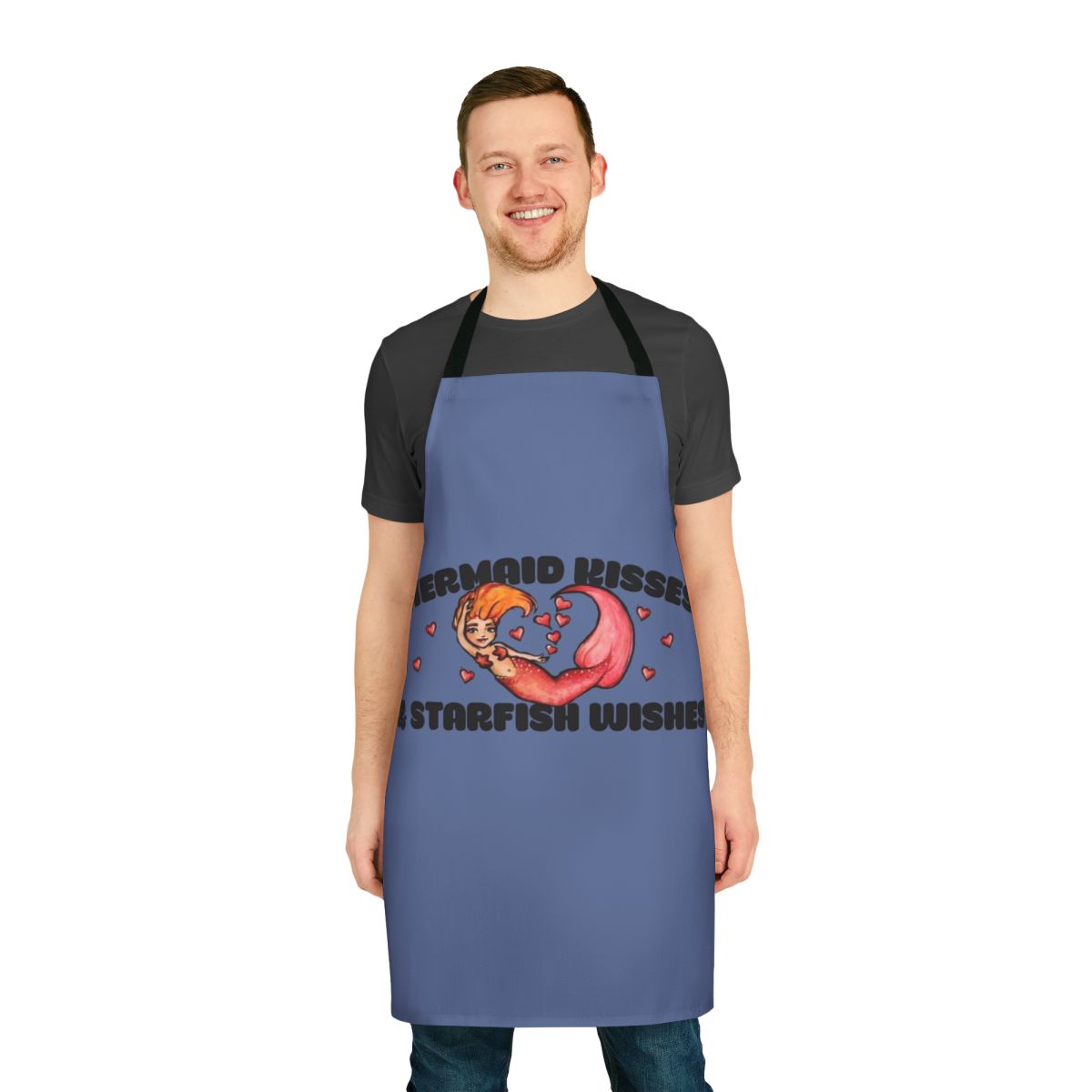 Whimsical apron featuring a cute, chibi-style mermaid design with the text "Mermaid Kisses And Starfish Wishes"