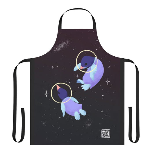 Whimsical apron featuring a cute penguin in an astronaut suit against a starry galaxy background