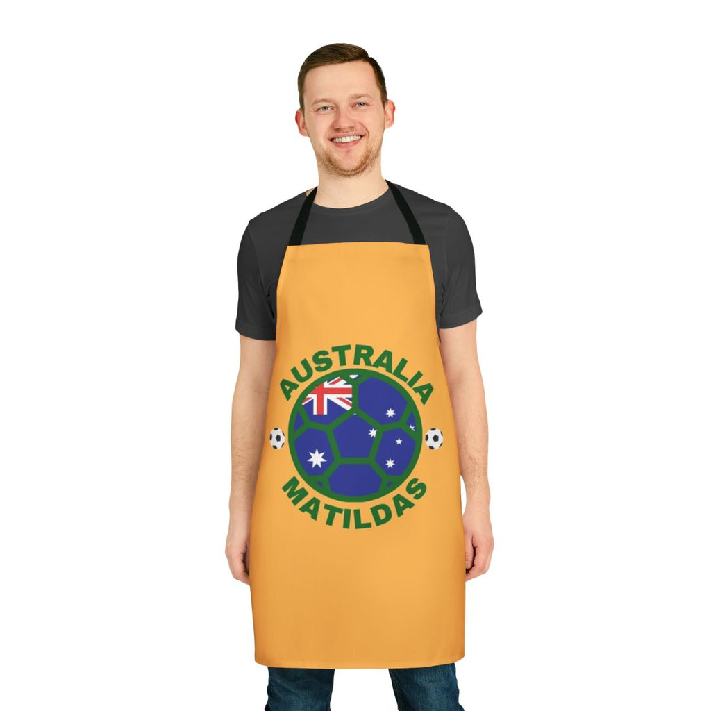 Green and yellow apron featuring the Matildas logo and Australia's national colors