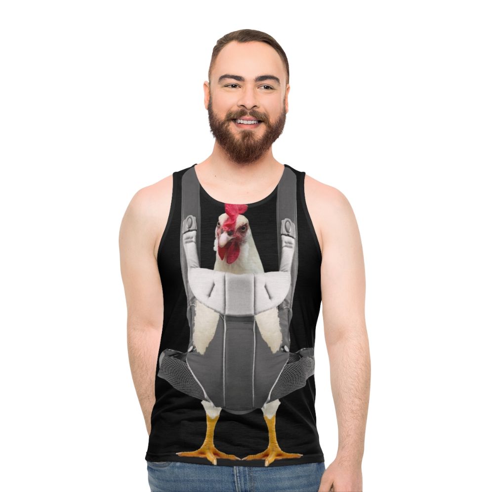 Chicken in a baby carrier printed on a white unisex tank top