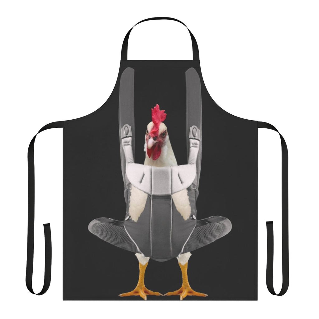 Person wearing an apron with a chicken design, carrying a chicken in a baby carrier