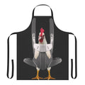 Person wearing an apron with a chicken design, carrying a chicken in a baby carrier